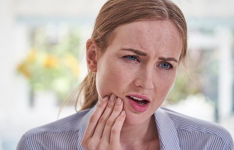 Woman Suffering From Toothache — Clarkston, MI — Mark Frenchi DDS Woman Suffering From Toothache — Clarkston, MI — Mark Frenchi DDS
