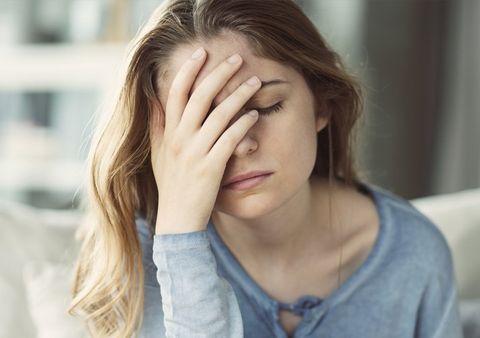 A Woman Having Headache — Clarkston, MI — Mark Frenchi DDS A Woman Having Headache — Clarkston, MI — Mark Frenchi DDS