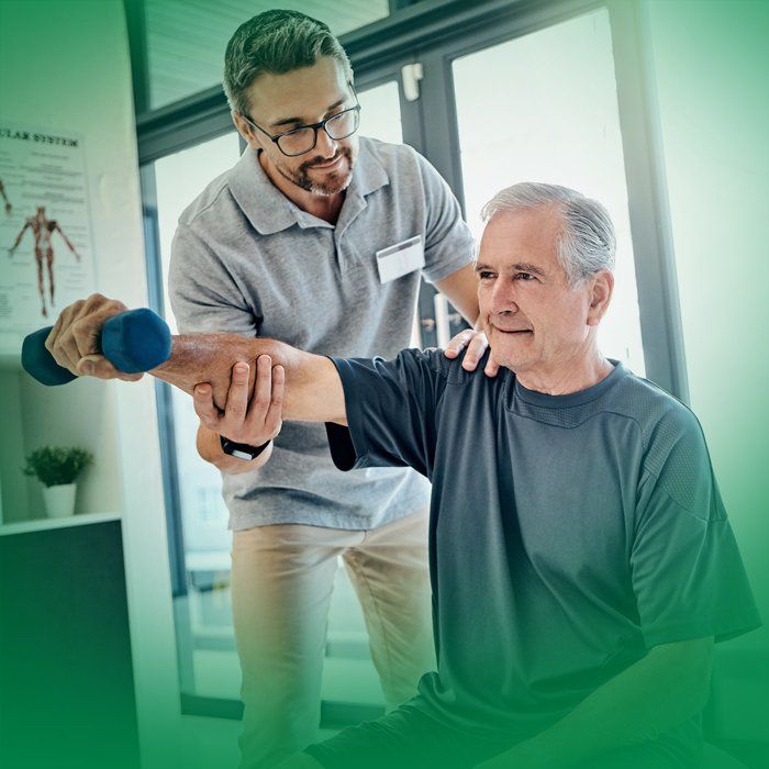 Physical Therapist working with client at Champion Rehab
