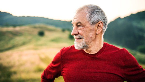 elderly man hiking