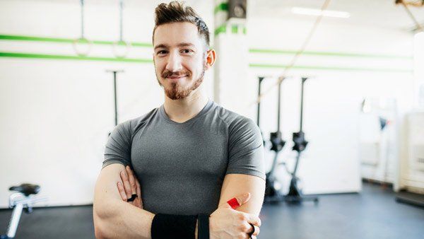 smiling athlete at gym