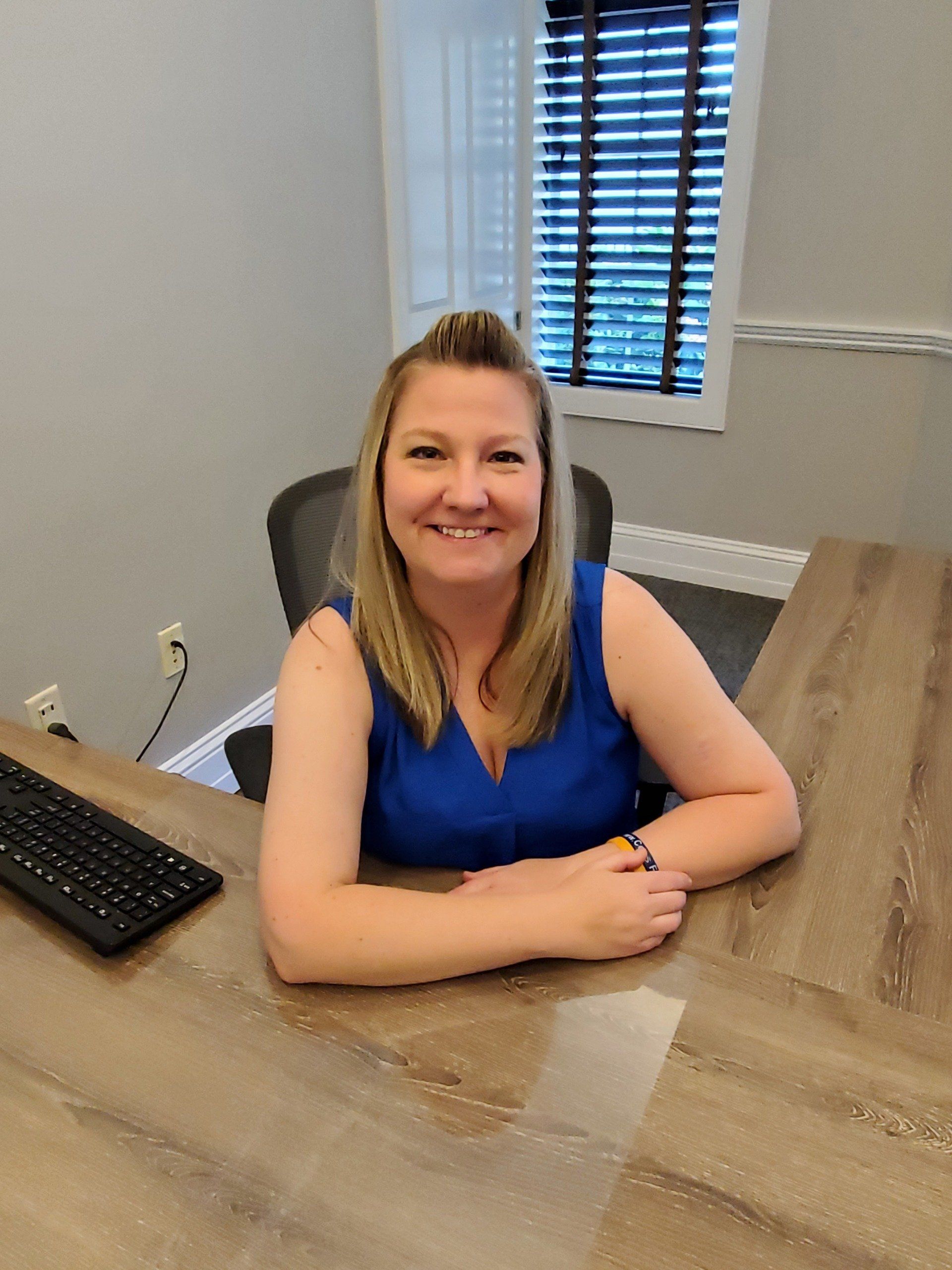 julie at her desk