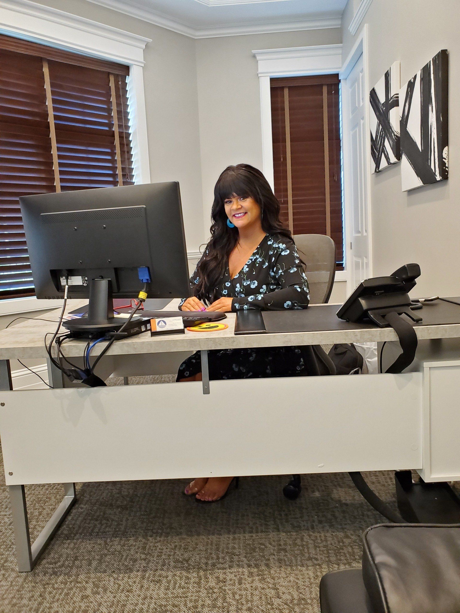 lori at her desk