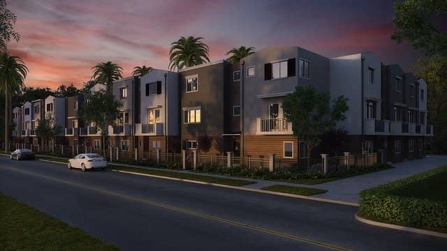 Condos at night for blog post about condo and town home insurance 