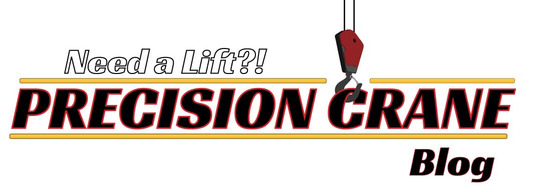A logo for precision crane blog with a picture of a crane