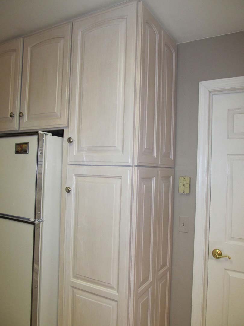 Cabinets Beside Door — The Tri-State Area — Carriage House II In-Home Restorations