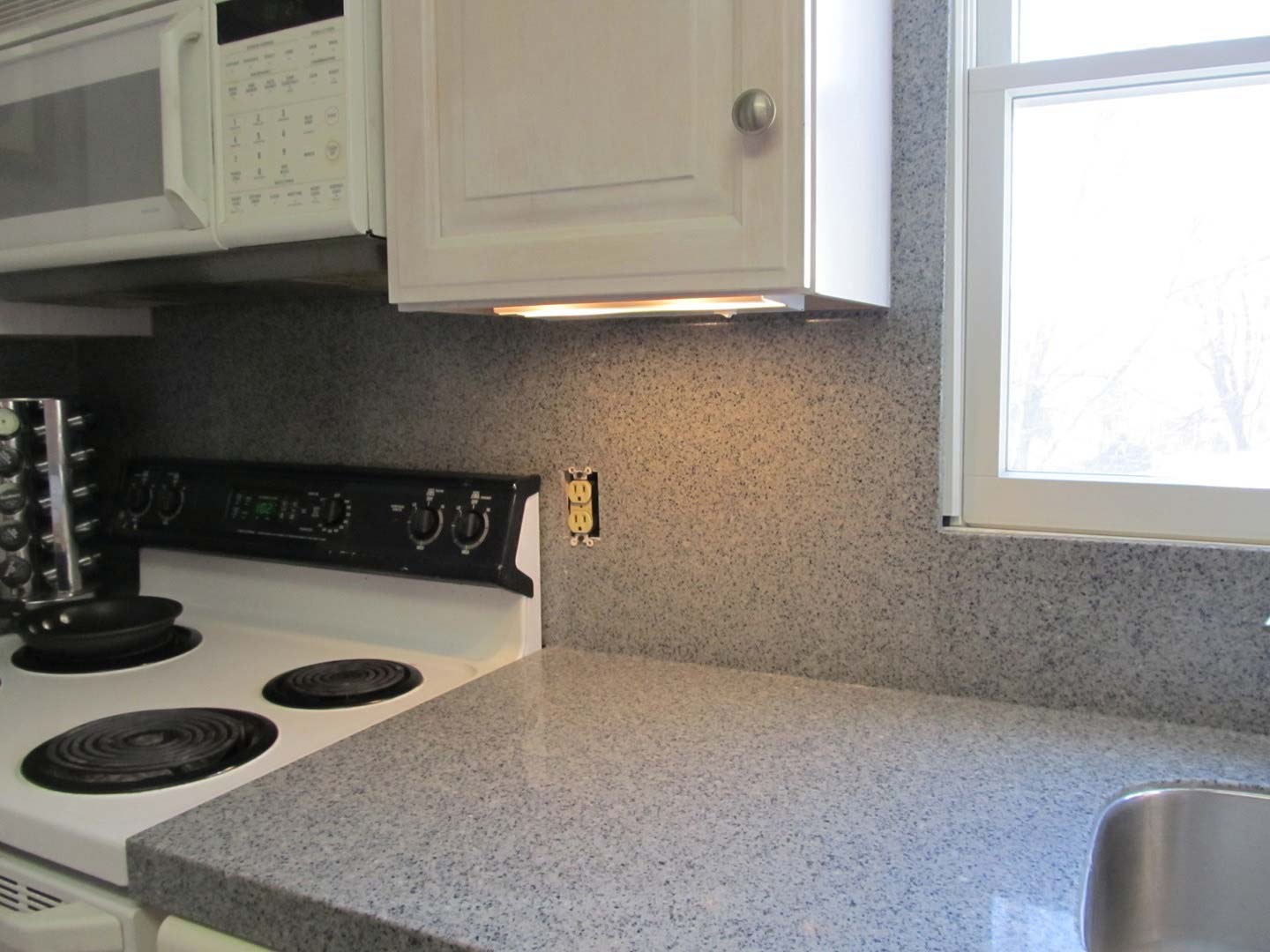 Kitchen with Granite Walls and Counter — The Tri-State Area — Carriage House II In-Home Restorations
