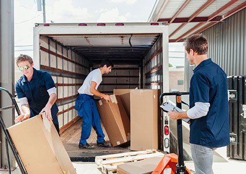 Imports — Workers Checking the Boxes in W. Palm Beach, FL Imports — Workers Checking the Boxes in W. Palm Beach, FL