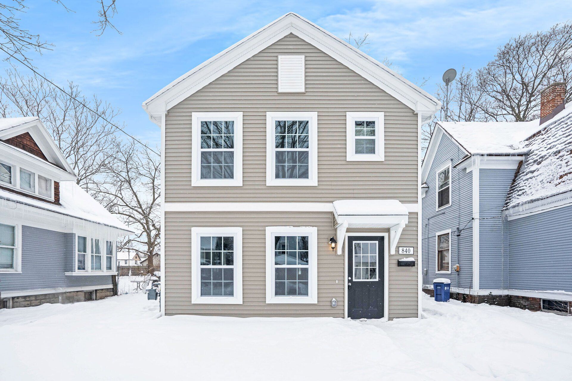 New Copper Bay single-family home exterior with front porch and garage