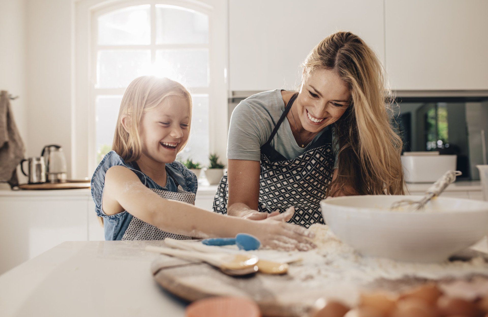 mom and daughter baking