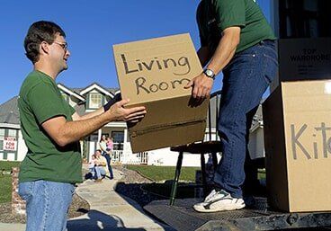Movers with box — Residential Movers in Altoona, PA Movers with box — Residential Movers in Altoona, PA