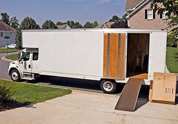 Moving and storage truck Side View With Open Door — Moving Company in Altoona, PA Moving and storage truck Side View With Open Door — Moving Company in Altoona, PA