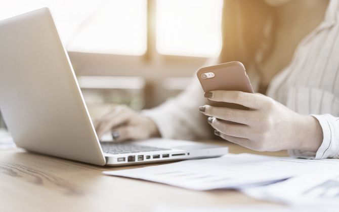 Using phone and laptop
