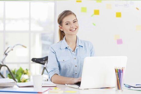 Smiling woman with laptop Smiling woman with laptop