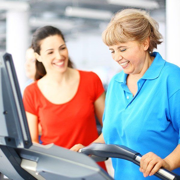 woman walking on treadmill