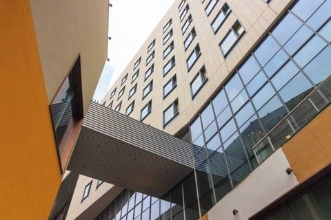 Window Tint — Commercial Building With Tinted Window in Albuquerque, NM