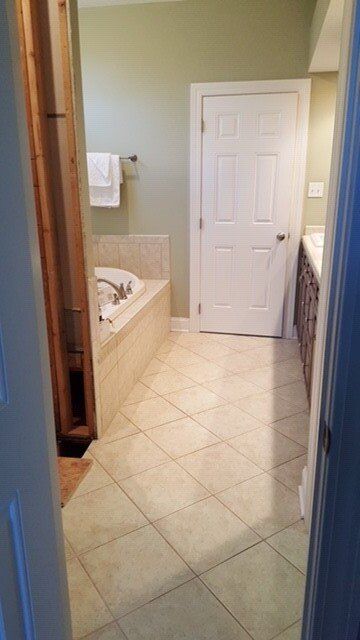 Bathroom with Diagonal Floor Tiles — Greensburg, PA — Ruggiero Kitchen, Bath & Flooring Design Studio
