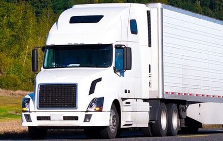 Green Truck — Trucking in Compton, CA Green Truck — Trucking in Compton, CA