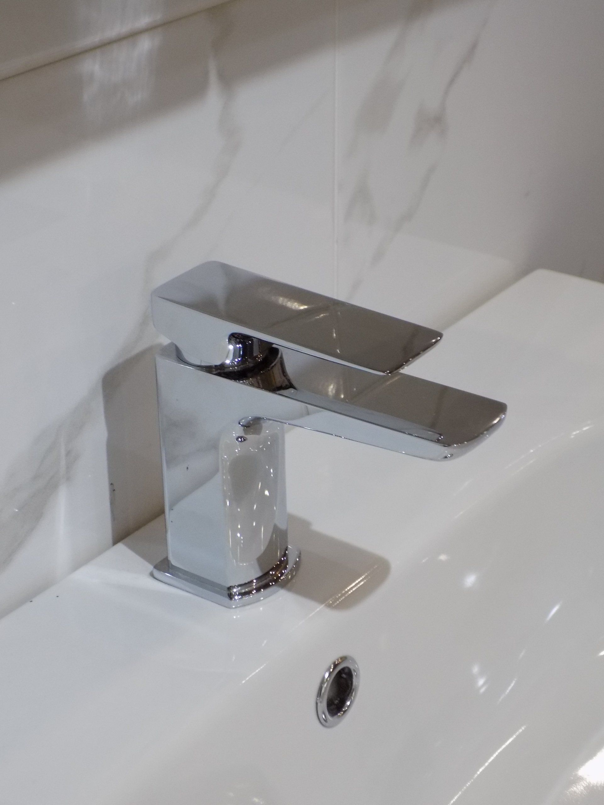 Wash basin and taps