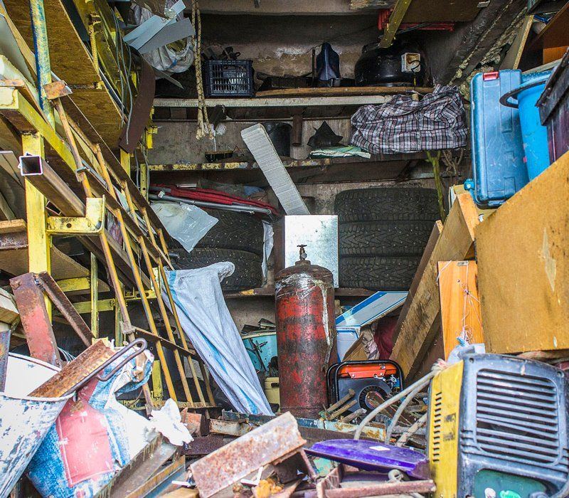 Big Mess in An Over Stuffed Suburban Garage — Toledo, OH — Margie's Cleaning & Liquidations Big Mess in An Over Stuffed Suburban Garage — Toledo, OH — Margie's Cleaning & Liquidations