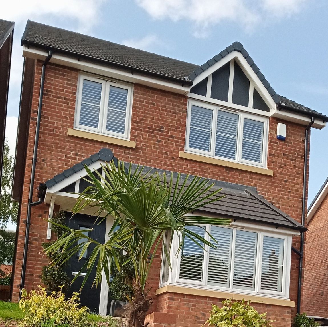 Lichfield Shutters central Lichfield Installation Job Full front of detached house fitted with plantation shutters 01543 580138
