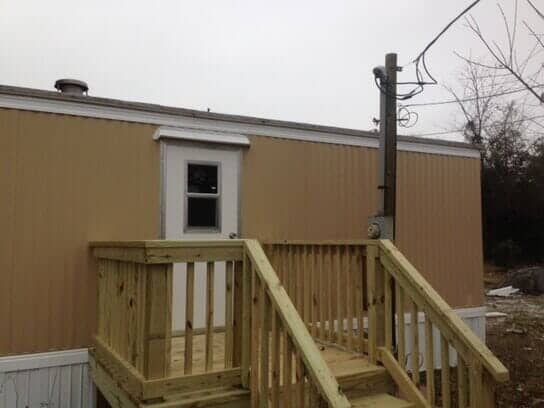 Wooden style house — manufactured home repair in Morehead City, NC