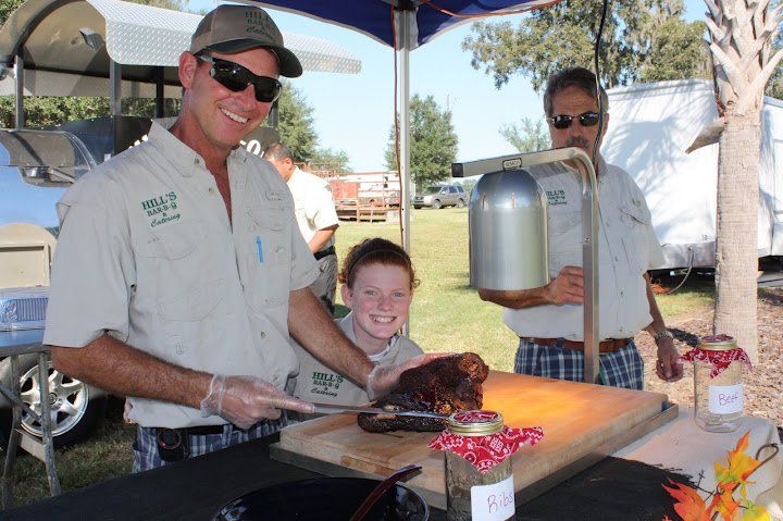 Men and Little Girl — Gainesville, FL — Hill’s Bar-b-que & Catering