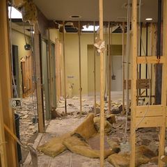 A room that is being remodeled with a lot of wood
