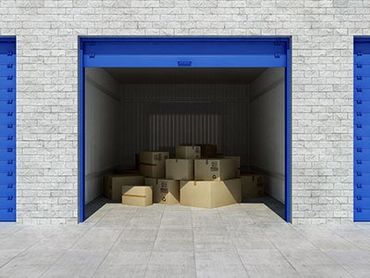 Storage — Man Opening Vault in West Carrollton, OH Storage — Man Opening Vault in West Carrollton, OH
