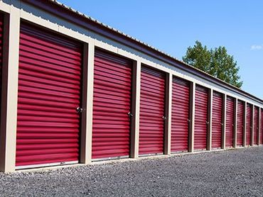 Storage Facilities — Garage With Maroon Doors in West Carrollton, OH Storage Facilities — Garage With Maroon Doors in West Carrollton, OH