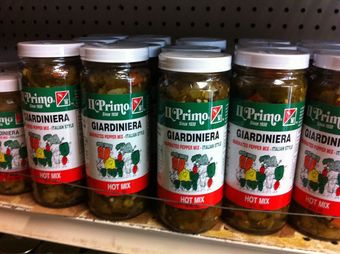 Jars of Primo Giardiniera hot mix on a store shelf