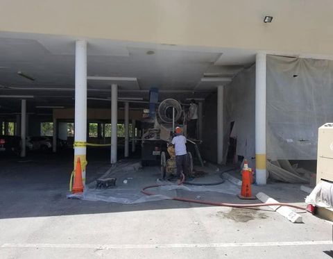 Workers Fixing The Ceiling — Miami, FL — Snapp Industries, Inc. Workers Fixing The Ceiling — Miami, FL — Snapp Industries, Inc.