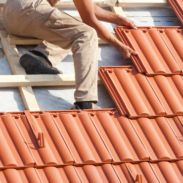 Roofing — Man Adding Roof in Seattle, WA