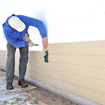 Siding — Man Adding Siding in Seattle, WA