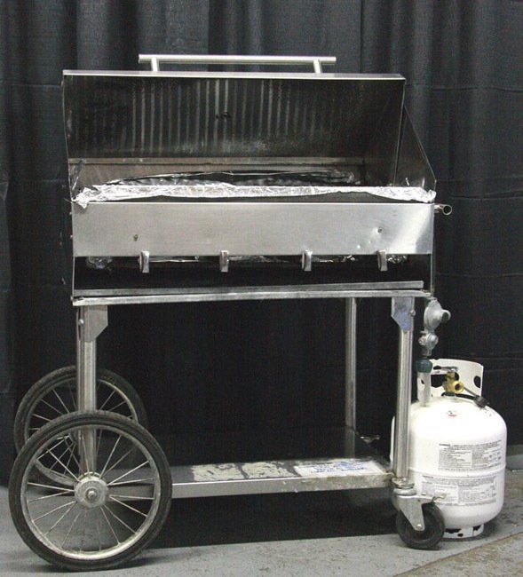 Large black metal grill on a cart with a propane tank attached on the right side.