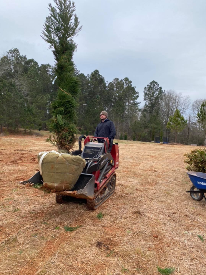 Cleaning Lawn With Mower — Watkinsville, GA — Four Seasons Lawn Maintenance