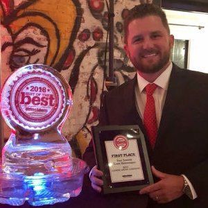 Chris Boswell With Award — Watkinsville, GA — Four Seasons Lawn Maintenance