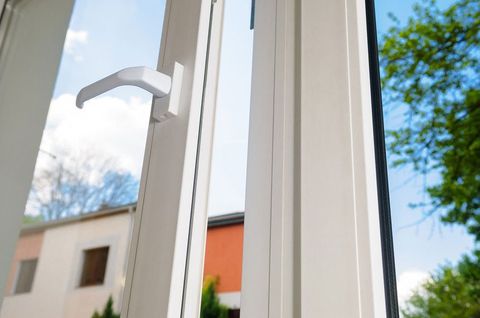 open plastic vinyl window on a background blue sky
