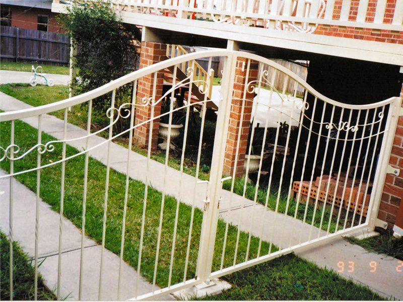 White Steel Fence with Curly Design — Projects in Wauchope, NSW