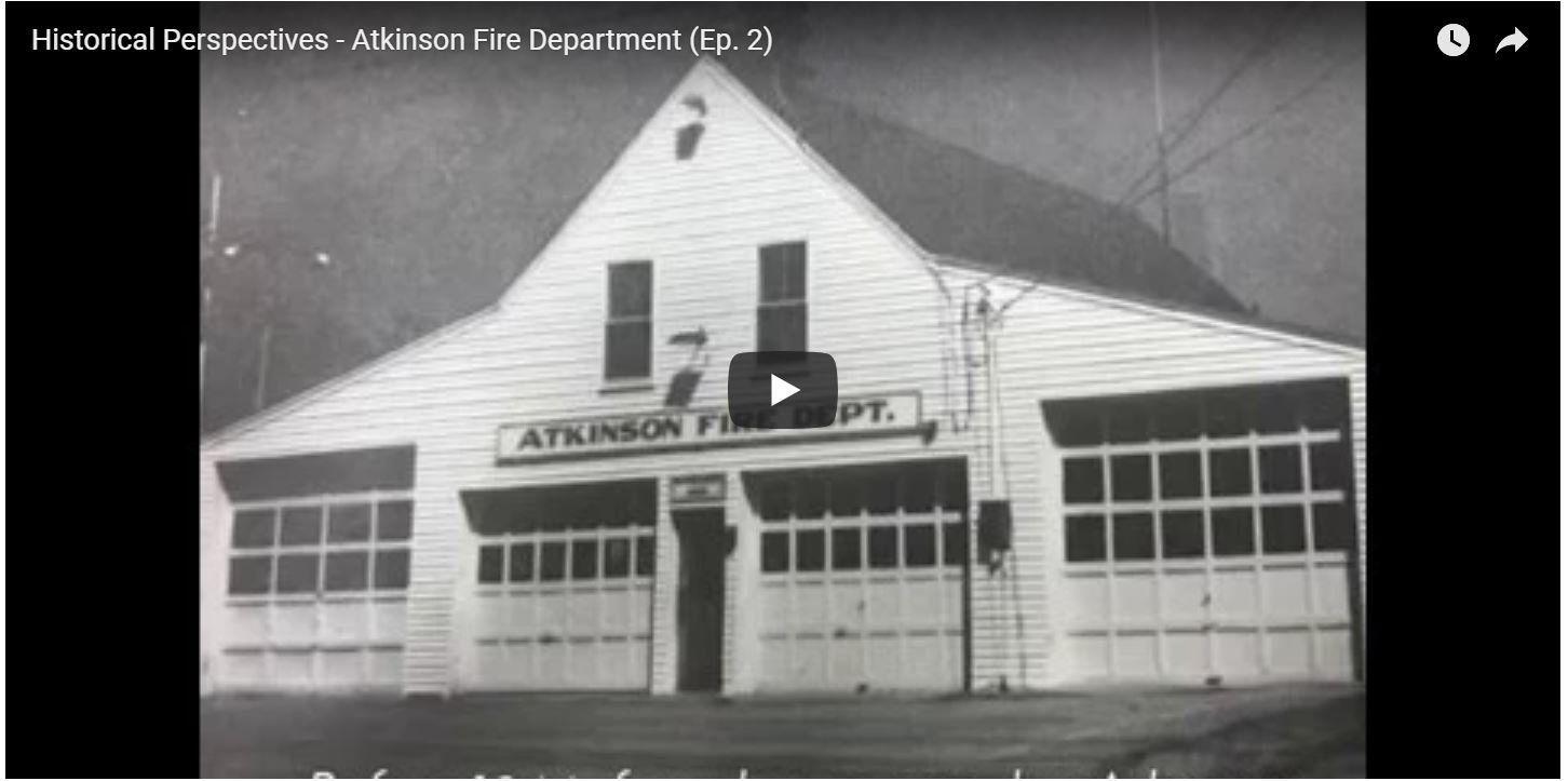 A black and white photo of an old fire station