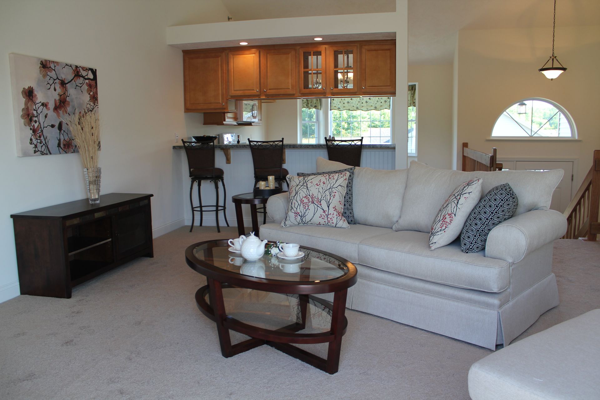 A living room with a couch and a coffee table