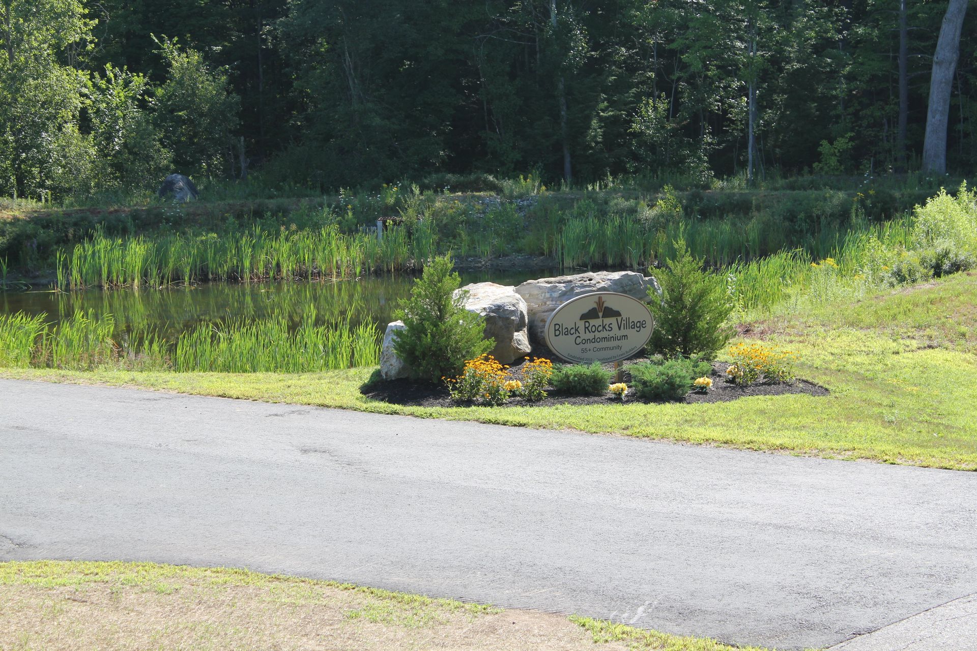A sign on the side of a road that says ' a ' on it