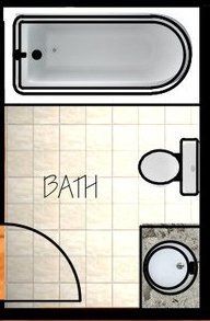 A bathroom with a bathtub , toilet , sink and mirror.