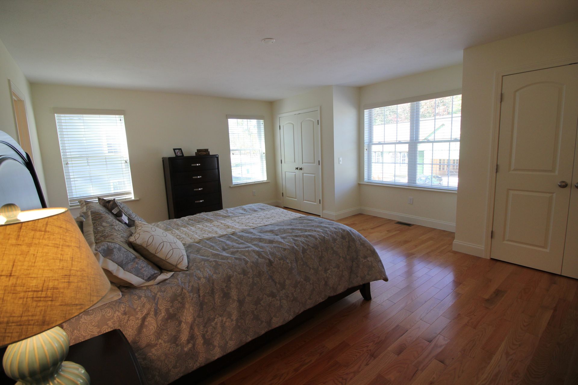 There is a large bed in the middle of the room.