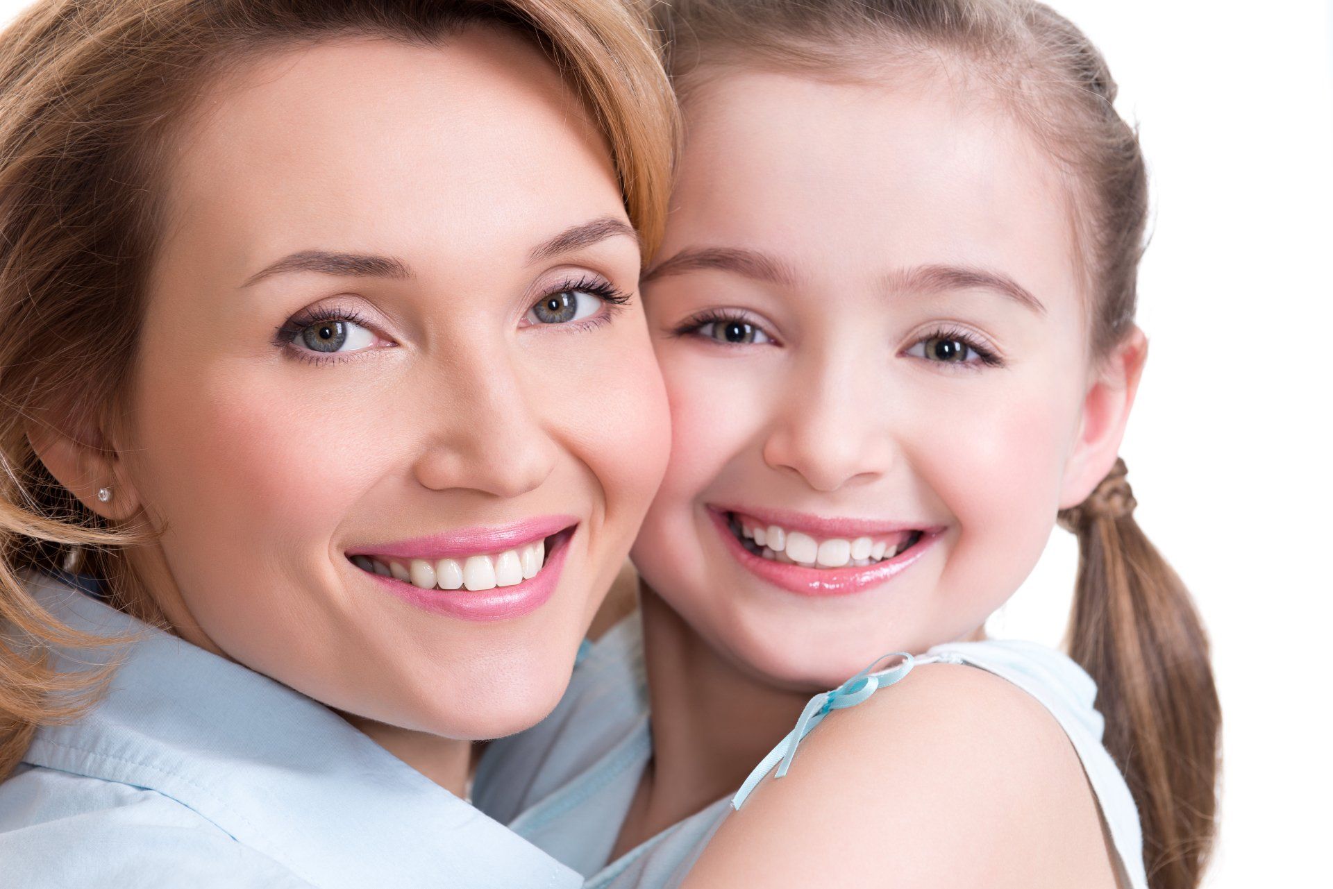 Happy Mother And Young Daughter - Dental Treatments in Port Macquarie, NSW Happy Mother And Young Daughter - Dental Treatments in Port Macquarie, NSW