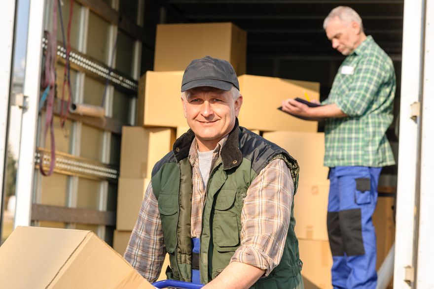 MOVING PERSONNEL UNLOADING BOXES 