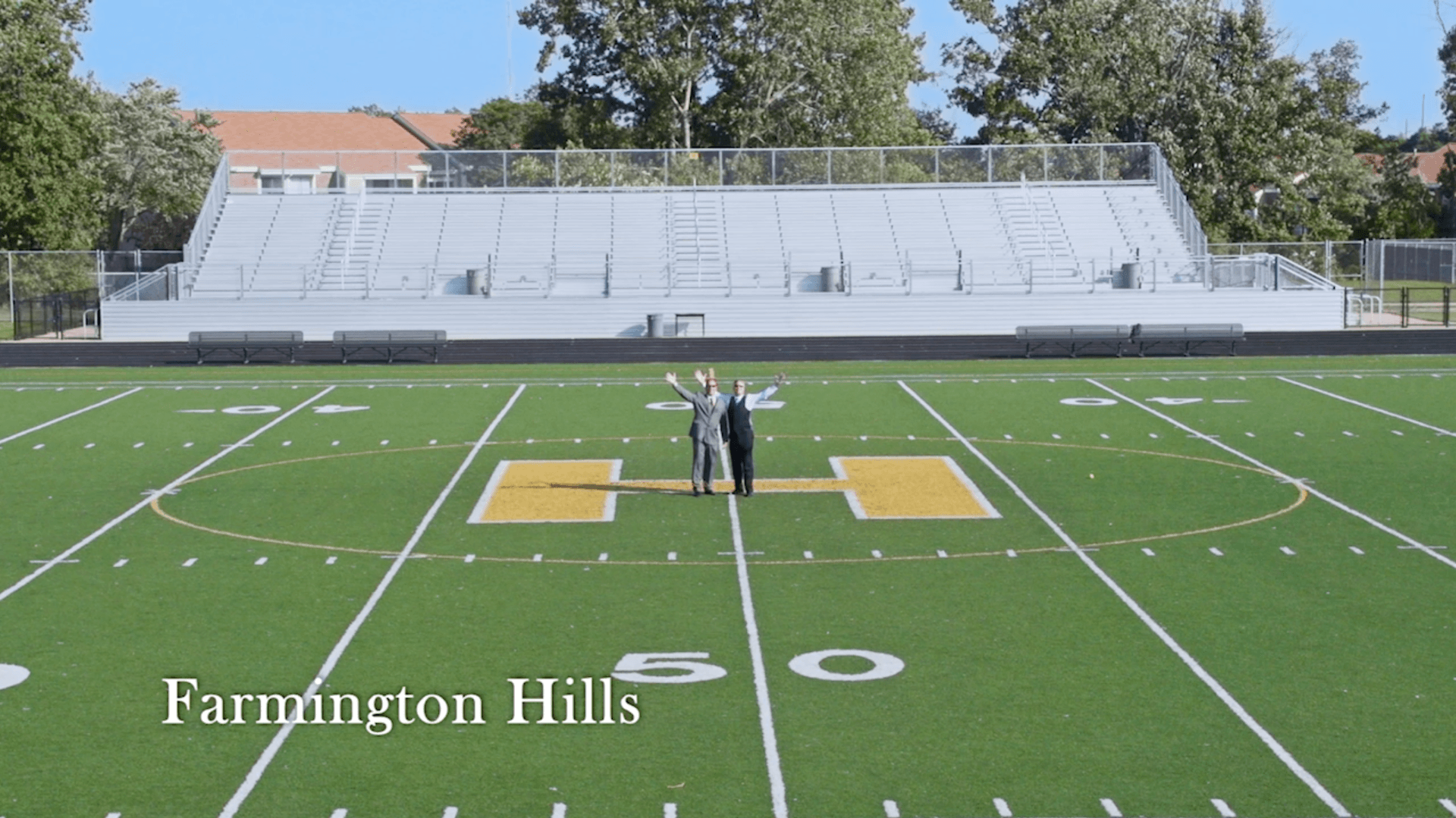 A football field with the words farmington hills on it