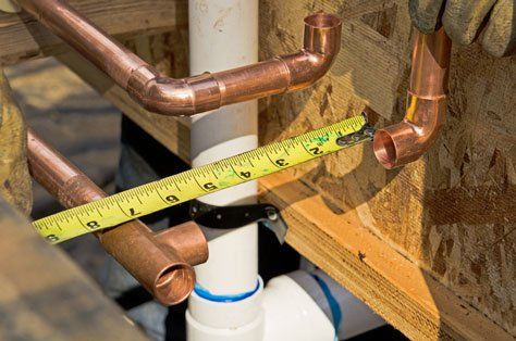 Sewage truck working in urban city environment — Septic in Knox,IN Sewage truck working in urban city environment — Septic in Knox,IN