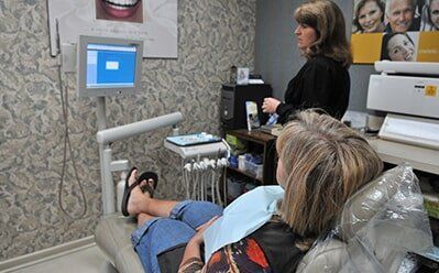 Staff With Dental Client — Bristol, TN — McMillin & Christian Family Dentistry
