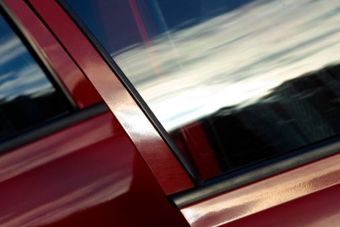 Auto Glass—Shiny red car window in Delran, NJ Auto Glass—Shiny red car window in Delran, NJ